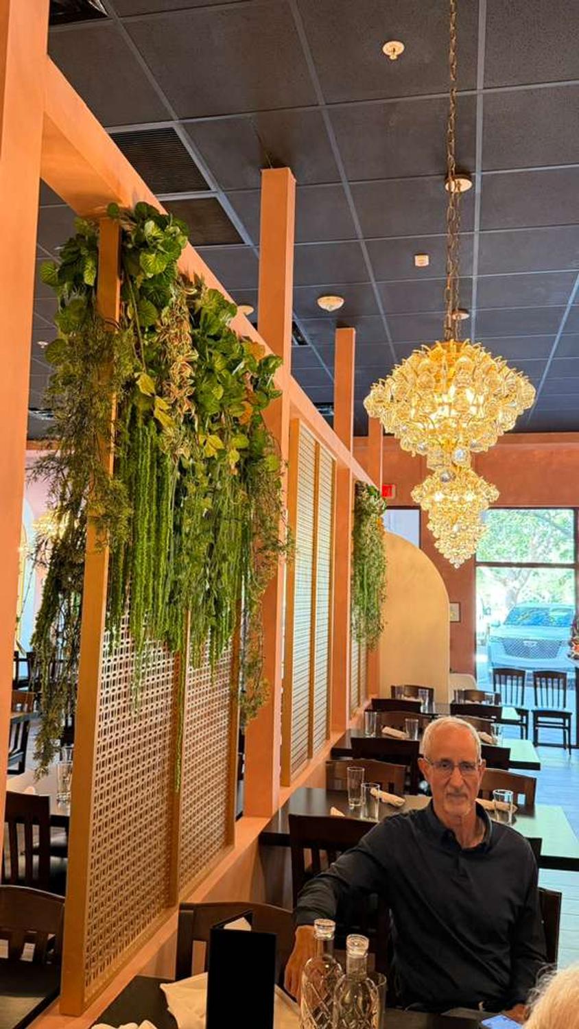 Bar counter and pendant lighting at Bombay Grove