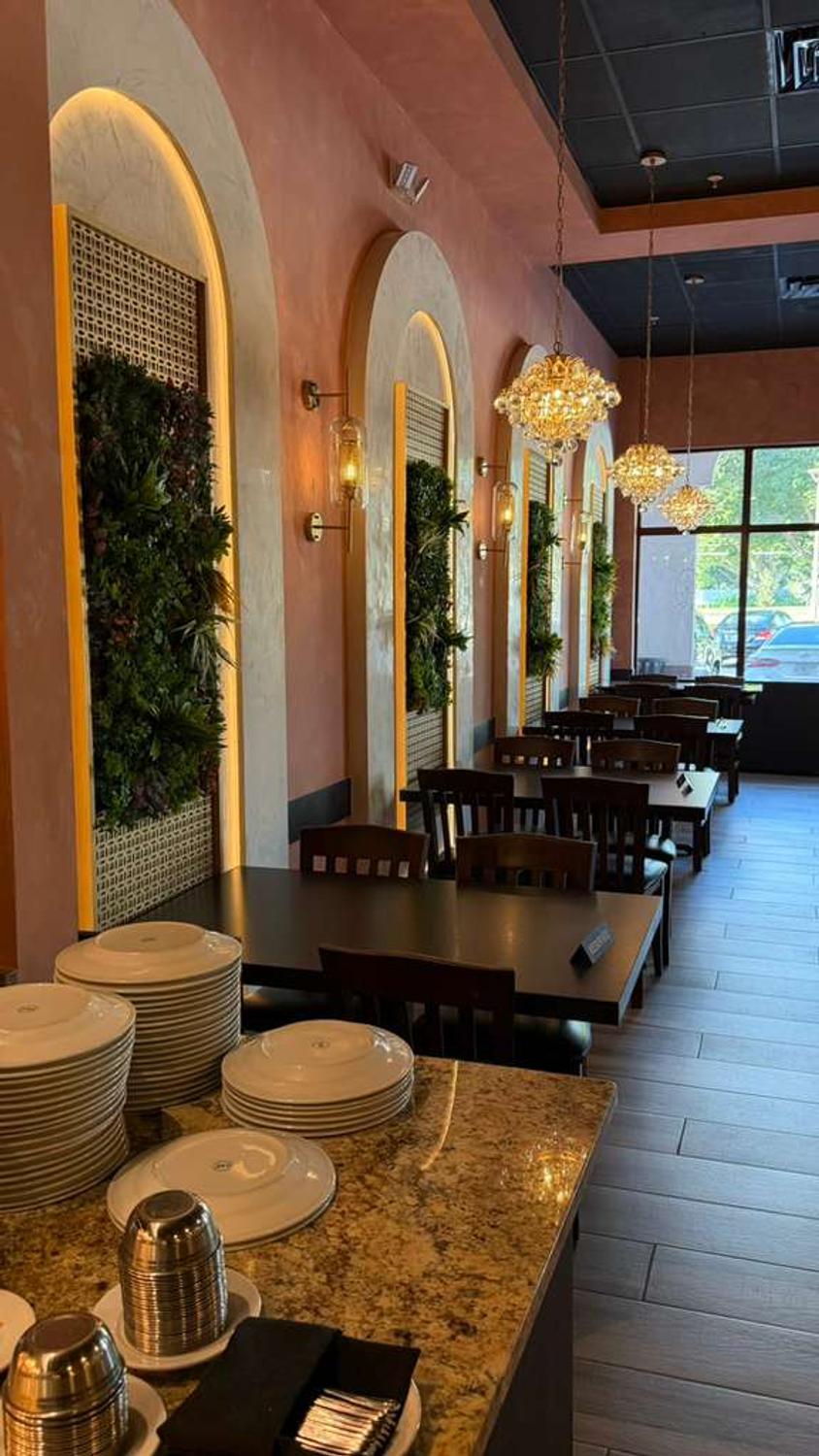 Arched alcoves with greenery in the dining room